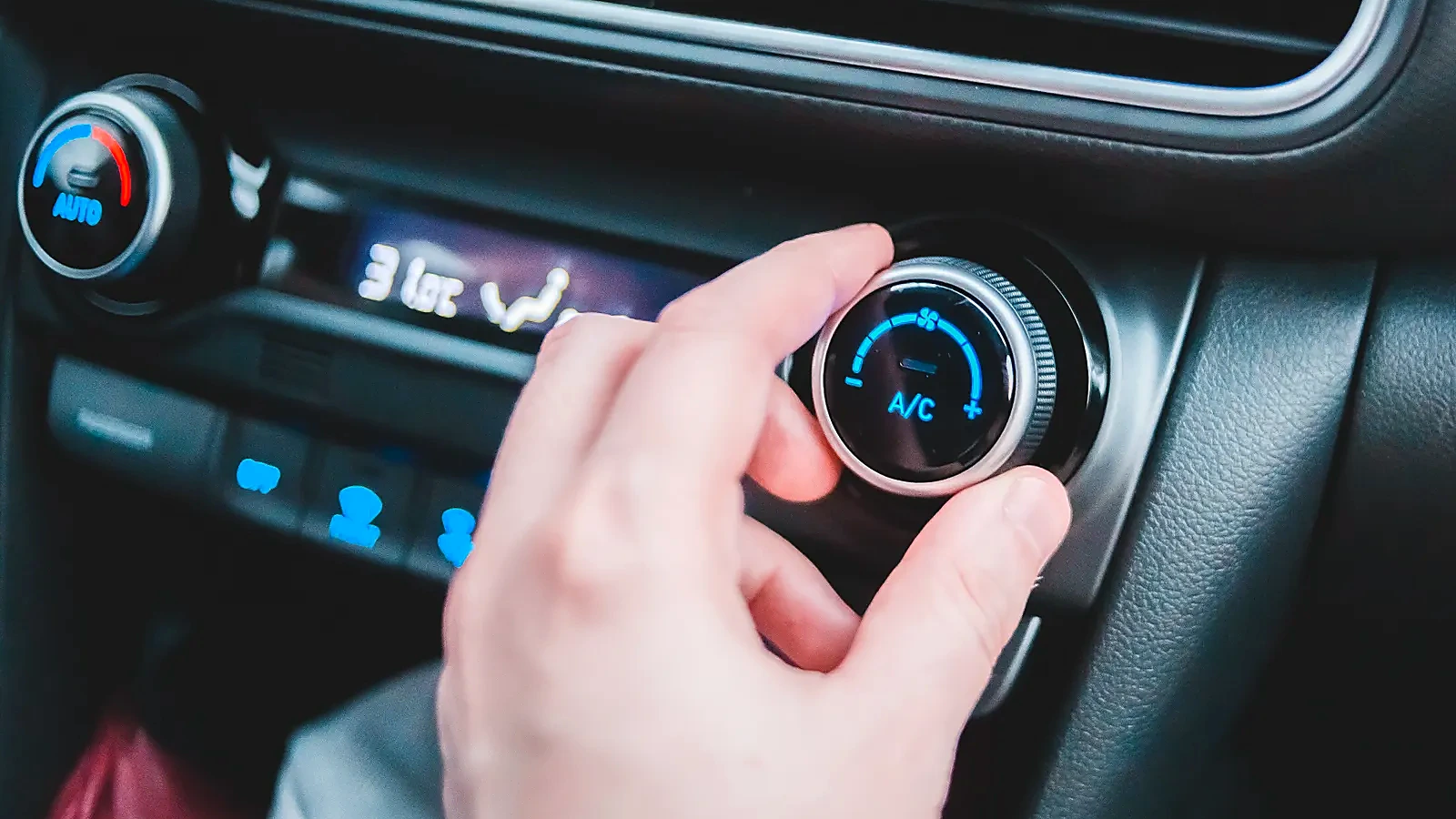 Hand adjusting automotive heating and air-conditioning controls