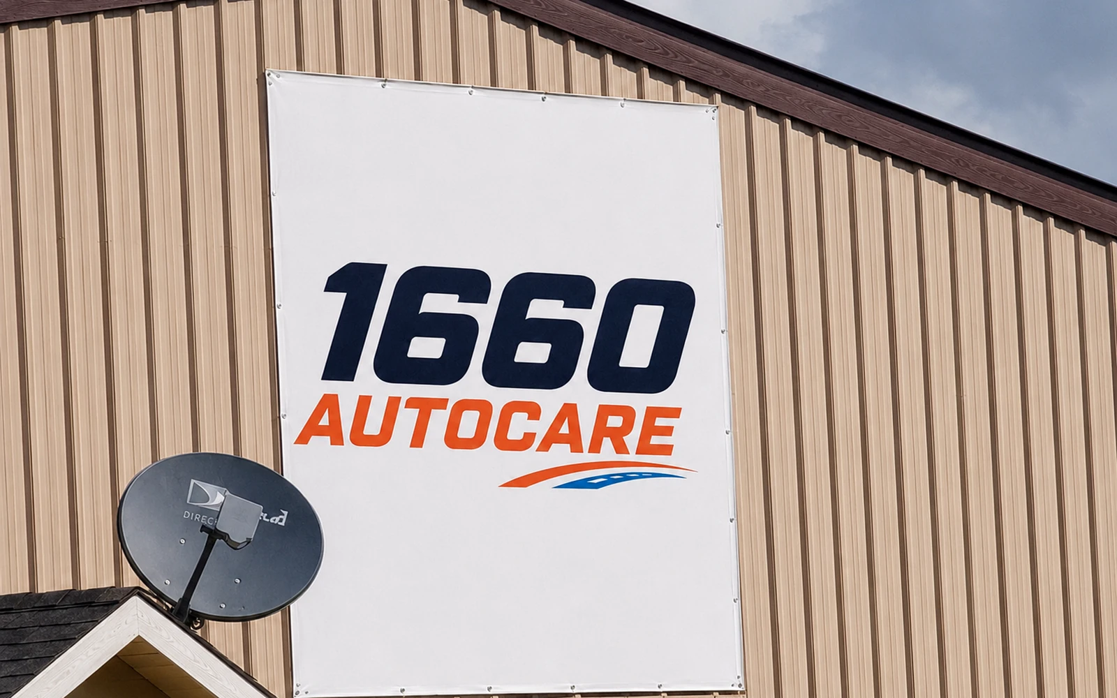 1660 Autocare shop exterior and branded sign in Taylor, Texas